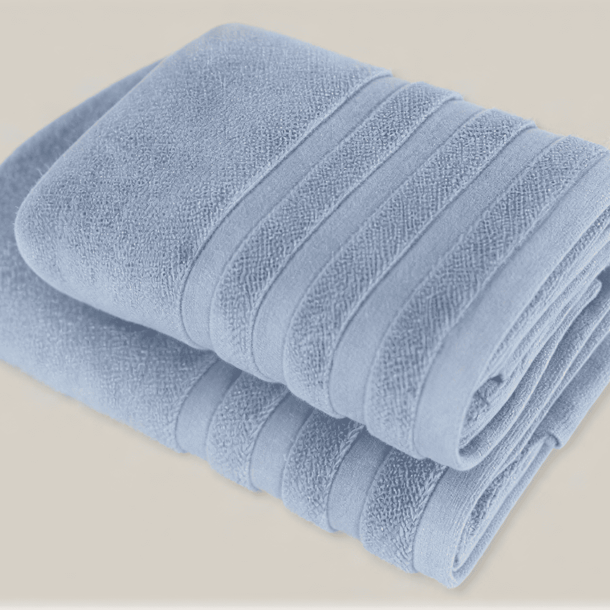 Velora 550-GSM Cotton Towel in blue, an organic cotton towel providing a soft, comfortable feel with a vibrant, refreshing color.