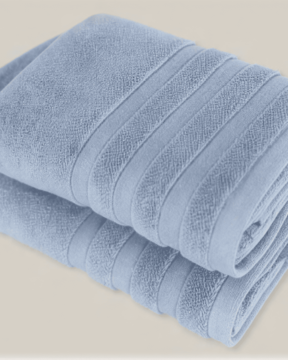 Velora 550-GSM Cotton Towel in blue, an organic cotton towel providing a soft, comfortable feel with a vibrant, refreshing color.