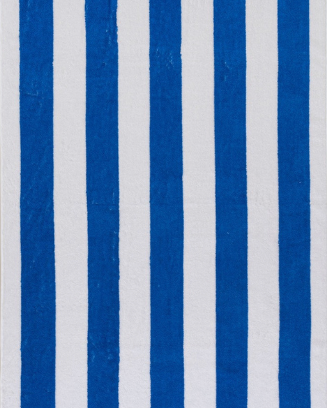 Royal Blue/White Cabana beach towel with strip motifs by Minoa Home.