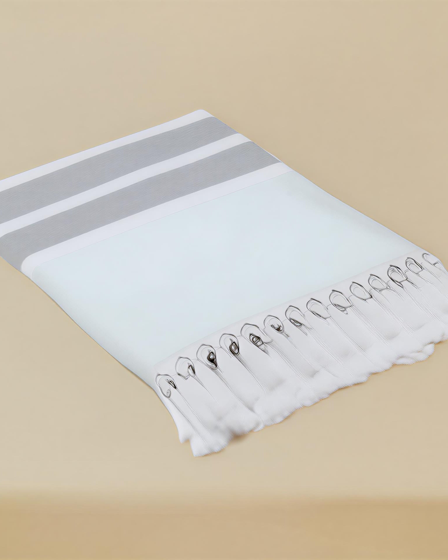 Green Mai Beach Towel with Flat Weave Face and Full Terry Loop Back with Knotted Fringe