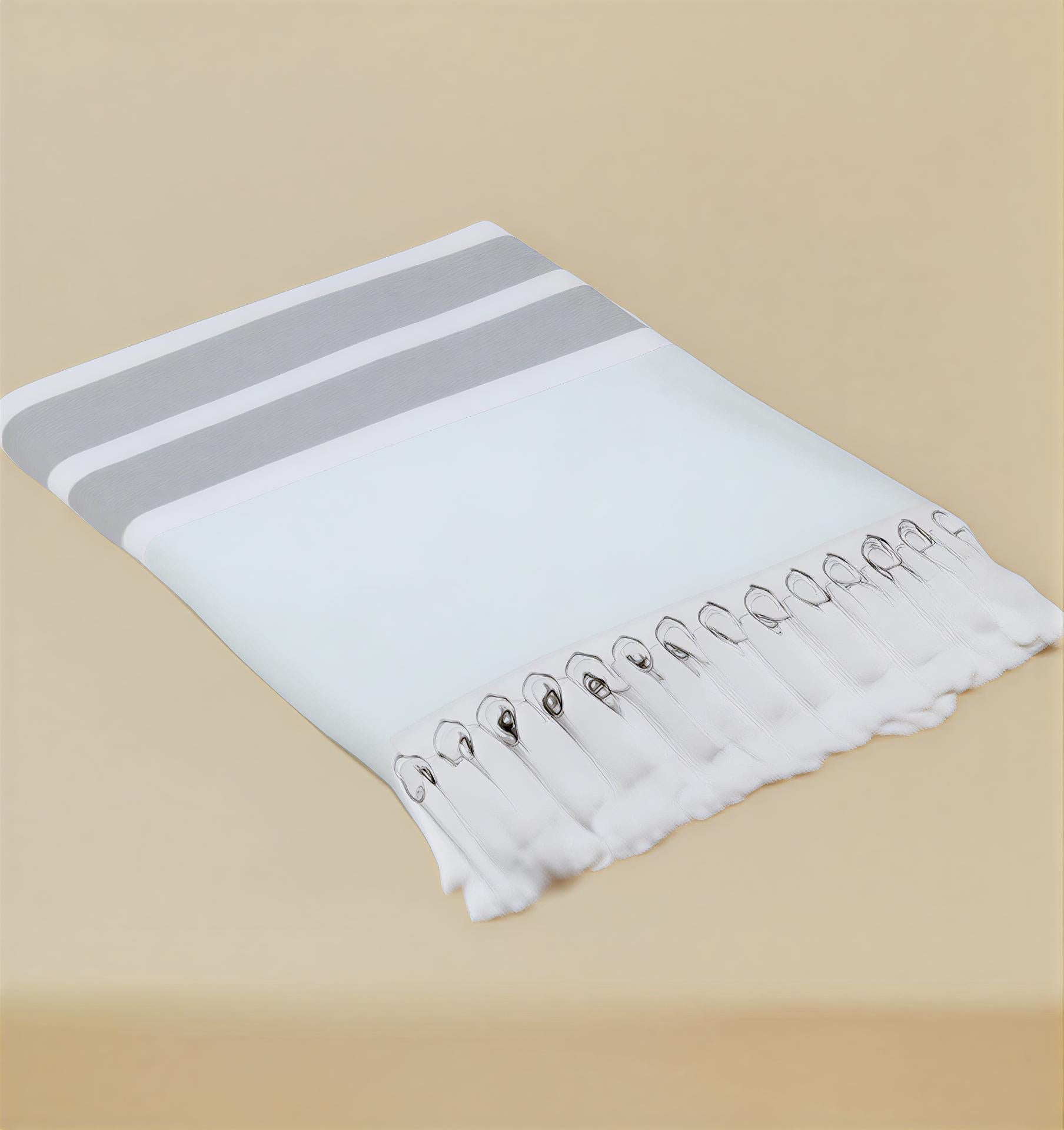 Green Mai Beach Towel with Flat Weave Face and Full Terry Loop Back with Knotted Fringe