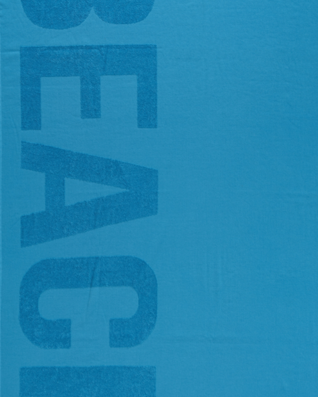 Blue Unika Beach Towel made with 100% organic and sustainable cotton