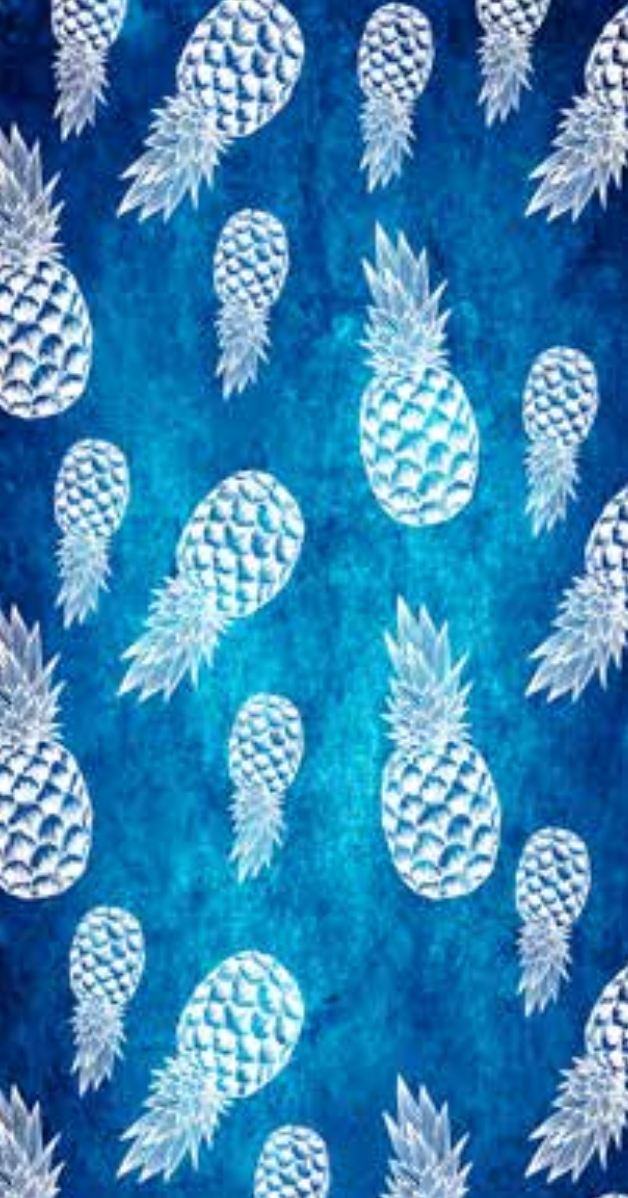 Patterned Beach Towels made with 100% cotton along with white pineapples on a blue background - Tropical
