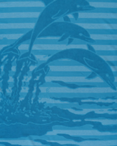 Blue Jenka beach towel with dolphin motifs on striped background by Minoa Home.