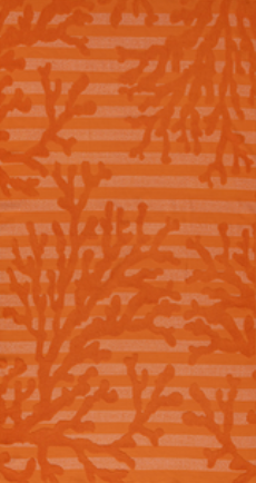 Orange Jenka beach towel with coral motifs on striped background by Minoa Home.