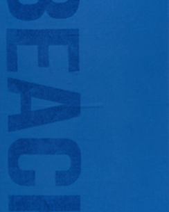 Royal Blue Unika Beach Towel made with 100% organic and sustainable cotton