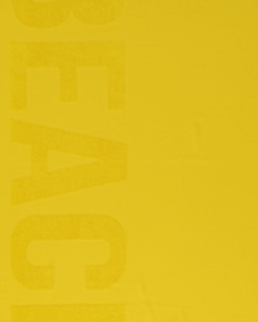 Yellow Unika Beach Towel made with 100% organic and sustainable cotton