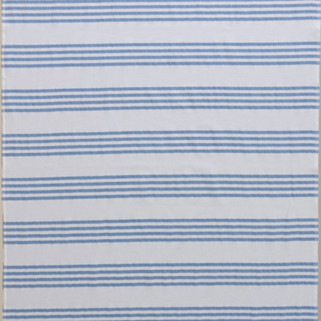 Navy/White Nesta beach towel made with 100% organic cotton, with a luxuriously soft texture and carefully fabricated comfort