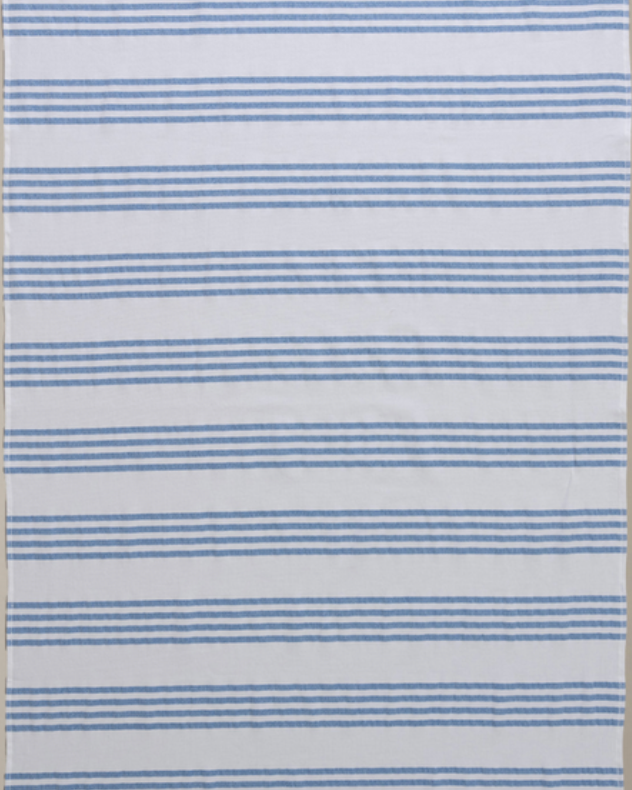 Navy/White Nesta beach towel made with 100% organic cotton, with a luxuriously soft texture and carefully fabricated comfort