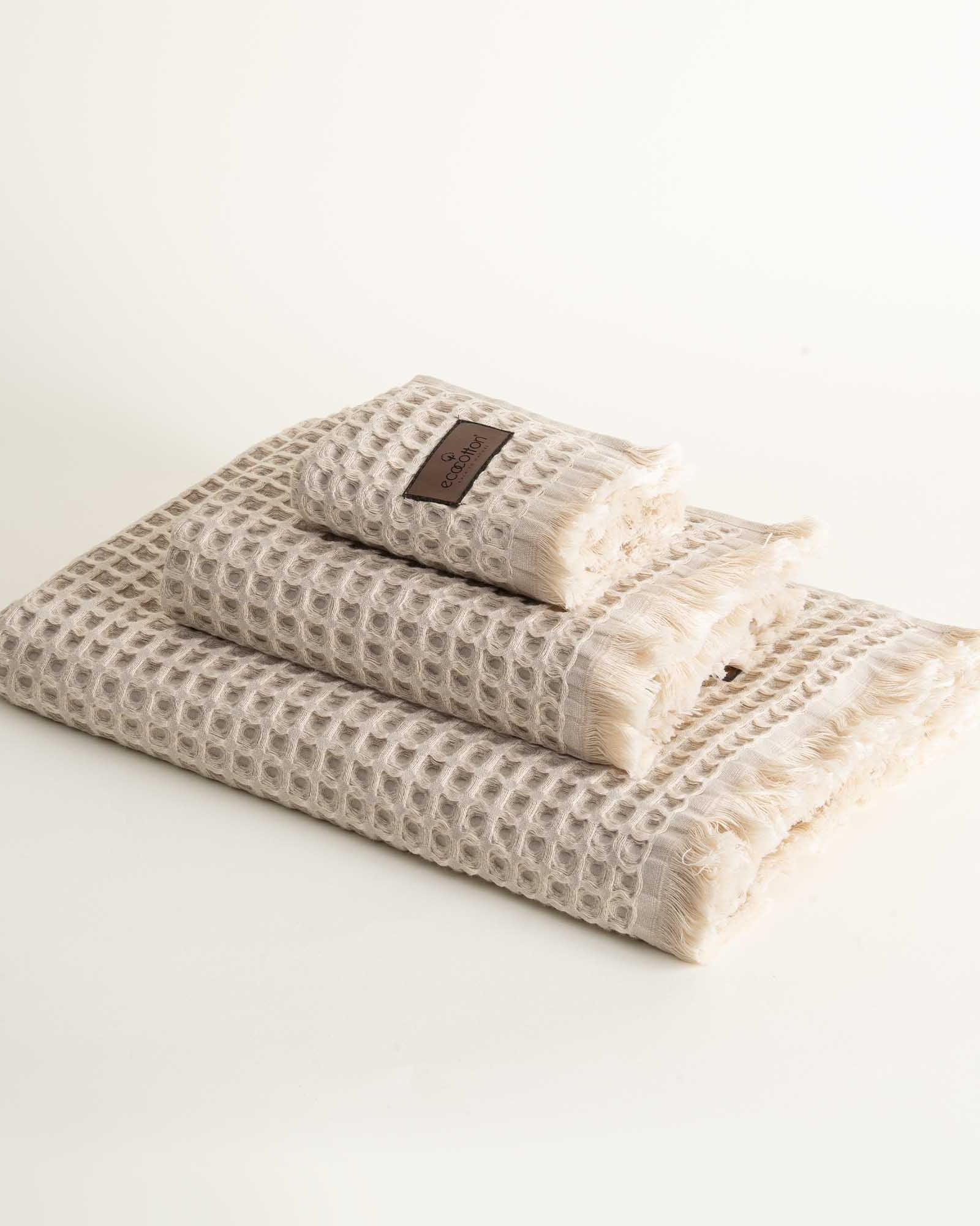 Yummy Vanilla Seren organic cotton waffle luxury bath towel set including hand and washcloth towels, highlighting soft texture and sustainable luxury