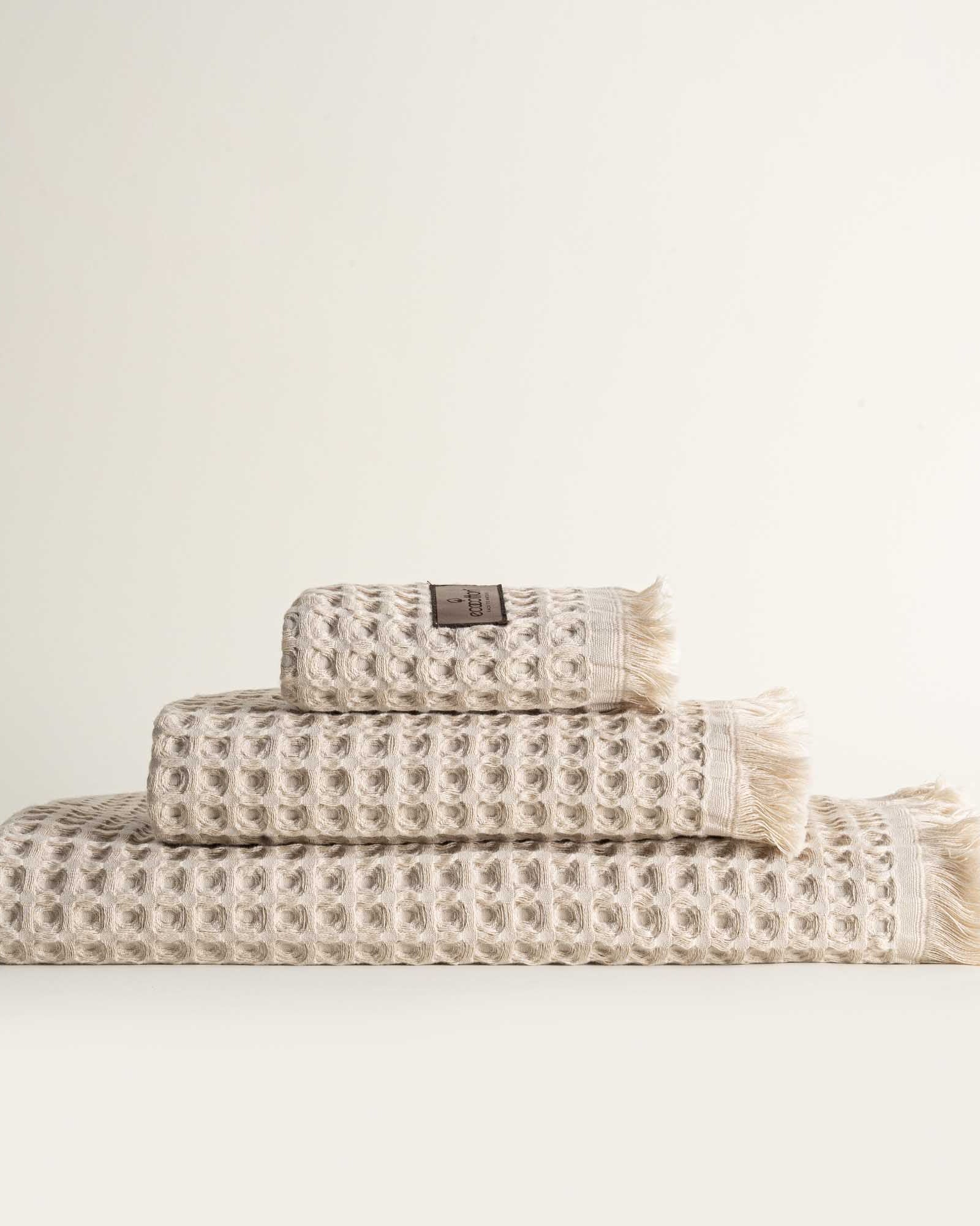 Yummy Vanilla Seren organic cotton waffle luxury bath towel set including hand and washcloth towels, highlighting plush texture and sustainable luxury