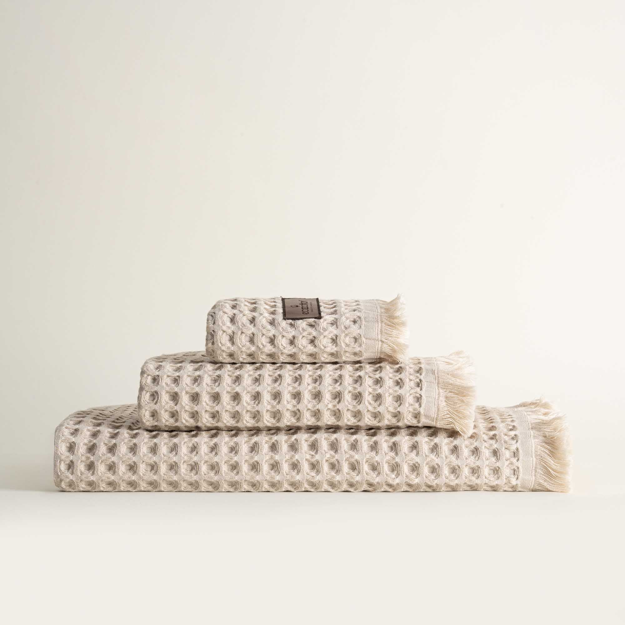 Yummy Vanilla Seren organic cotton waffle luxury bath towel set including hand and washcloth towels, highlighting plush texture and sustainable luxury