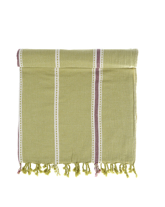Green towel with striped pattern and fringes on a white background
