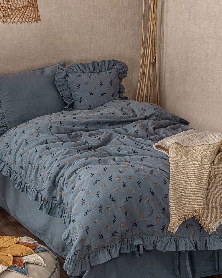 Muslin Duvet Cover Set in navy blue made with organic sheets.