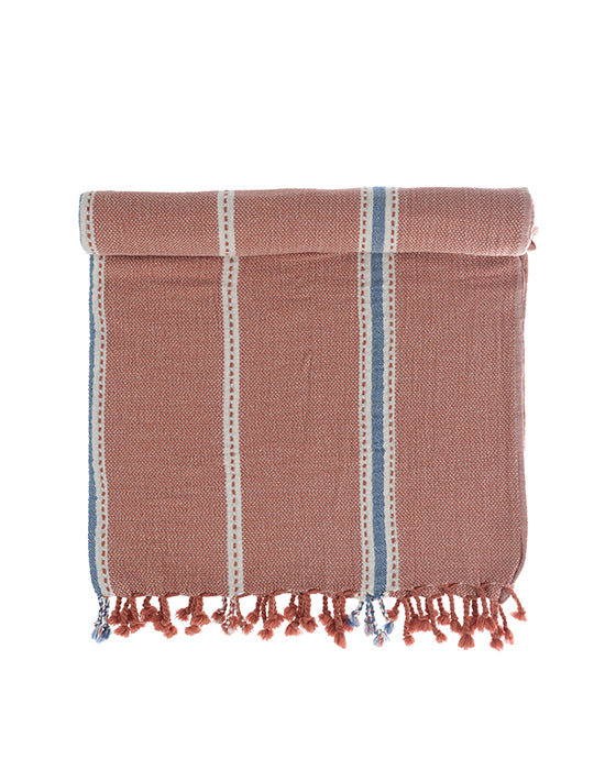 Folded hazelnut colored Tulum 200 gram Aegean Cotton and Linen Turkish towel with white and blue stripes handcrafted from sustainable cotton by Minoa Home highlighting the softness and quality of an organic bath towel