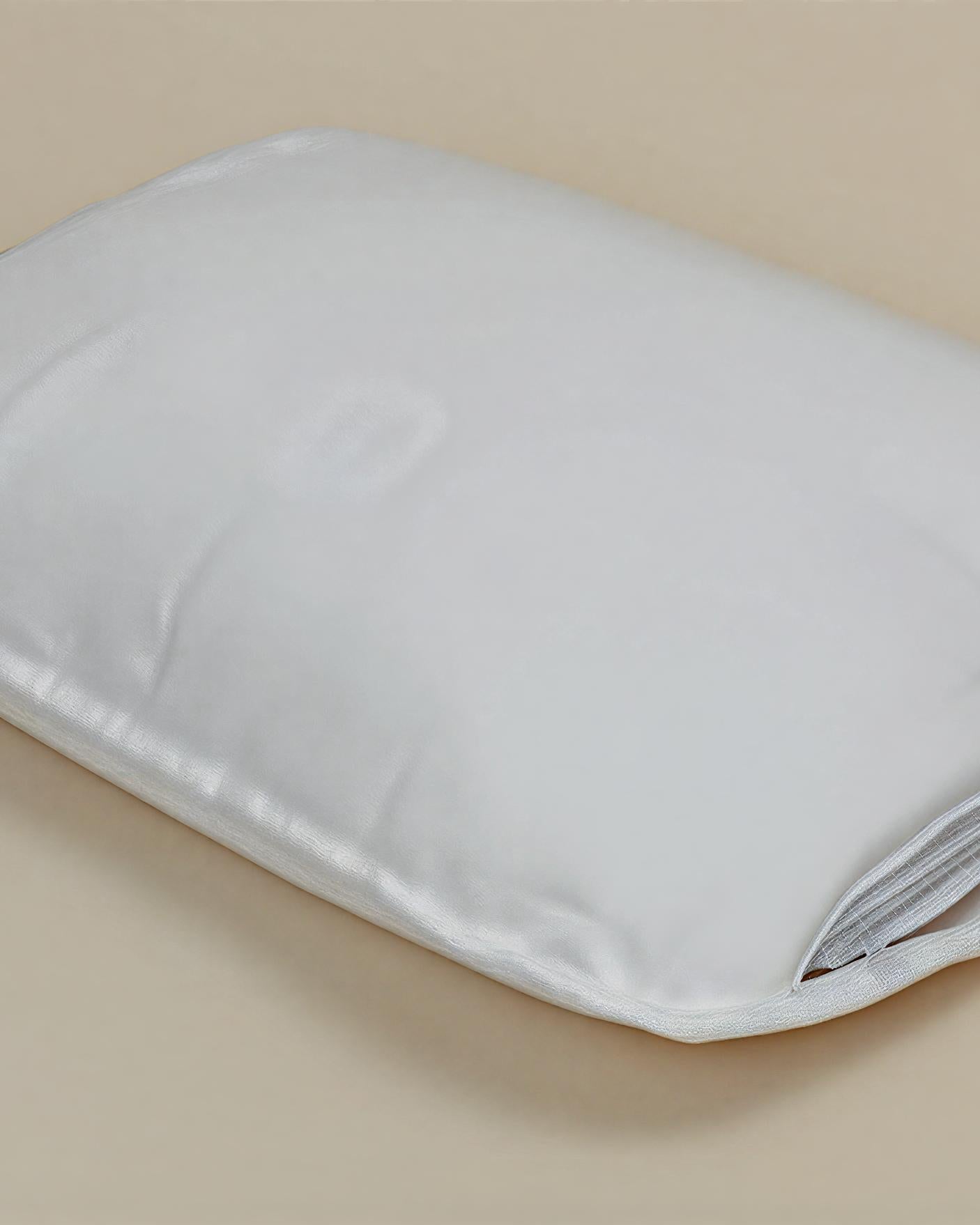 Soft organic cotton pillow with a side zipper by Minoa Home, made with organic sheets, ideal for adjustable comfort and hypoallergenic support.