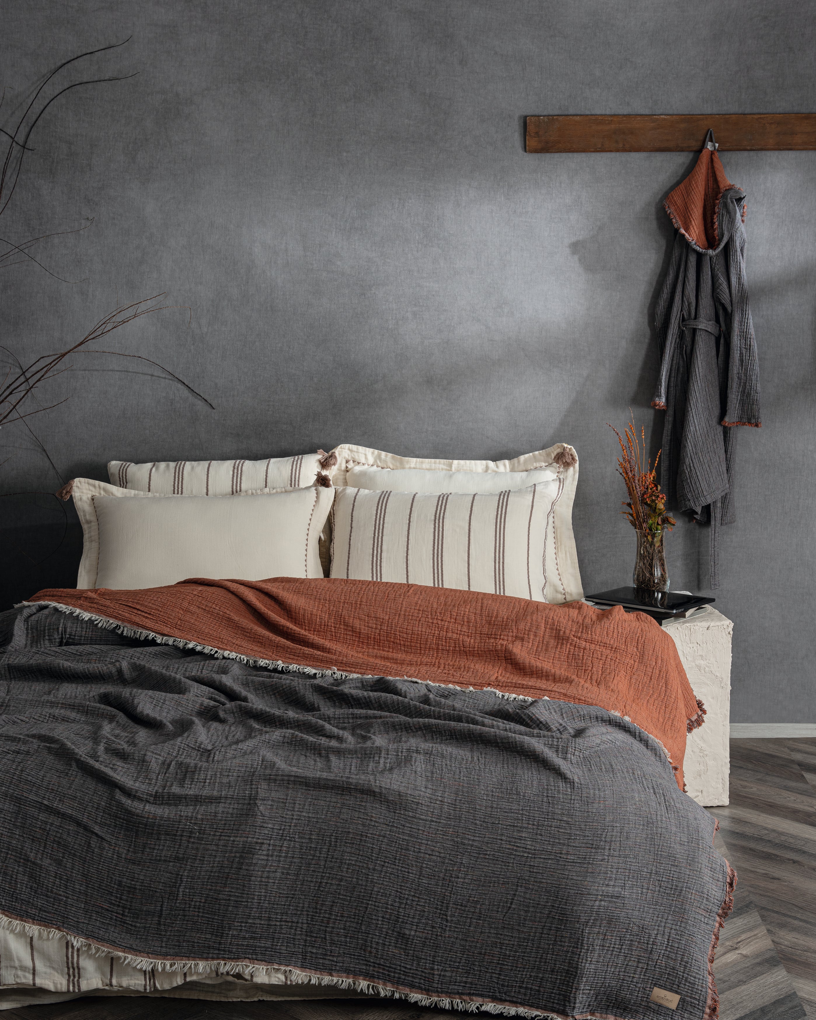 Reversible Muna organic gauze bed spread in Terra, soft earthy throw crafted for sustainability with organic cotton sheets.
