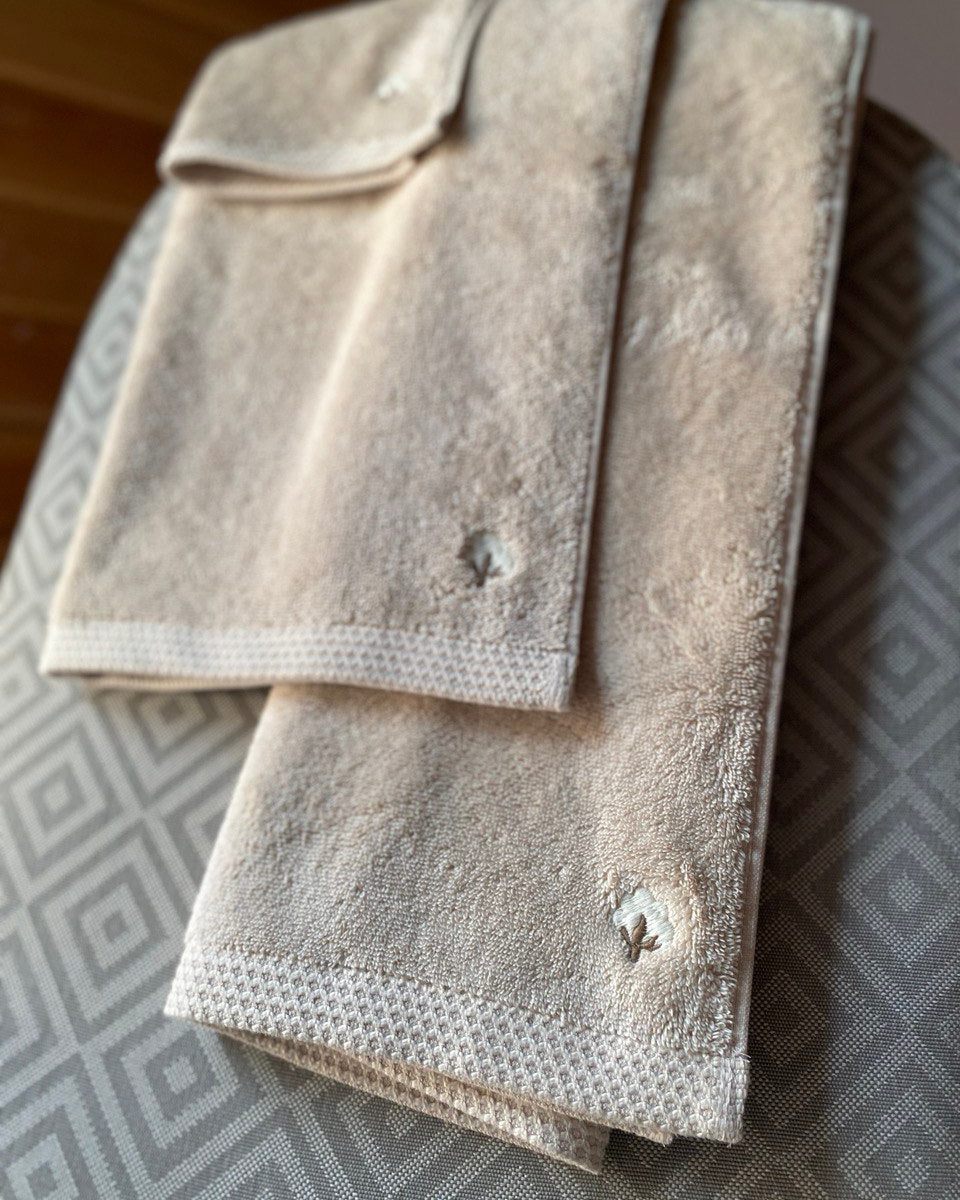 Close-up of Minoa USA Canada Jasper organic Aegean cotton luxury bath towel set, highlighting soft plush texture, elegant design, and sustainable luxury