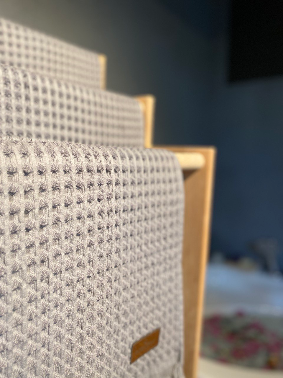 Minoa USA Canada Seren organic cotton waffle luxury bath towels hanging with plush waffle texture, showcasing sustainable luxury