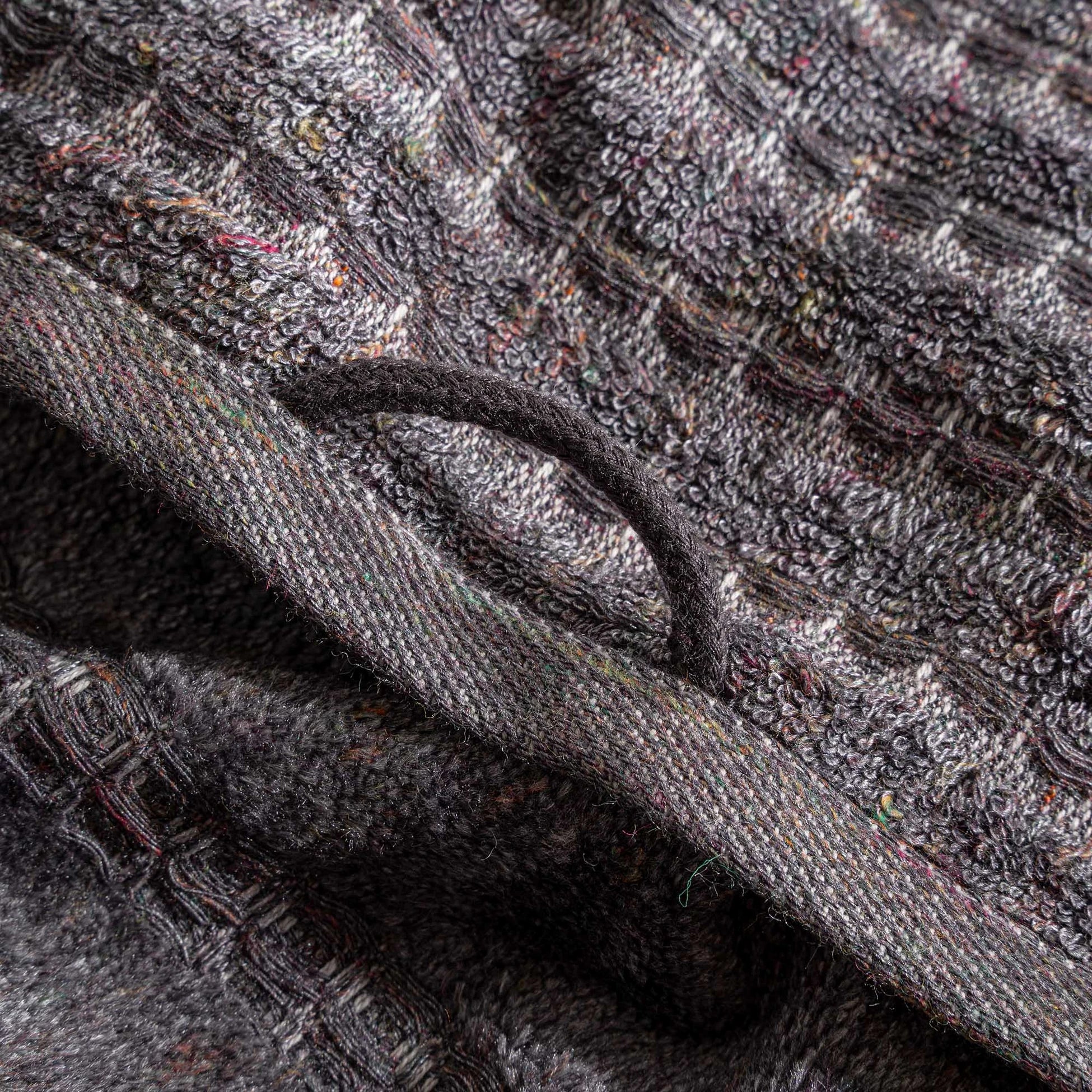 Close-up of the Zeus Organic Cotton Bath, Hand & Washcloth Set in Cozy Cobalt, showcasing the soft texture, vibrant colour with a hanger