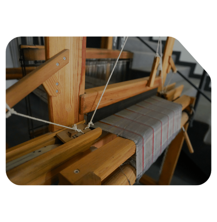 Minoa's woven machine by the staircase