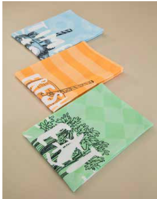 Set of 3 health-themed cotton kitchen towels displayed together in blue, orange, and green, each featuring a unique digitally printed design