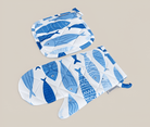 A pair of digitally printed Marin glove made with 100% cotton by Minoa, with fish patterns on it