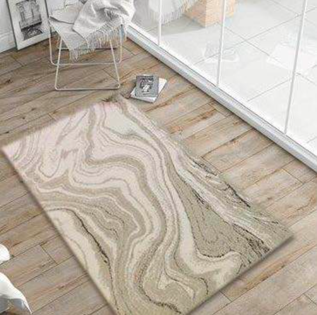 Ecru/Beige/Silver Bath Rug placed on the floor, featuring a soft, elegant design with silver accents for a sophisticated bathroom look