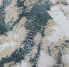 Refreshing aqua bath rug with ecru and beige, bringing a cool and tranquil touch to your bathroom