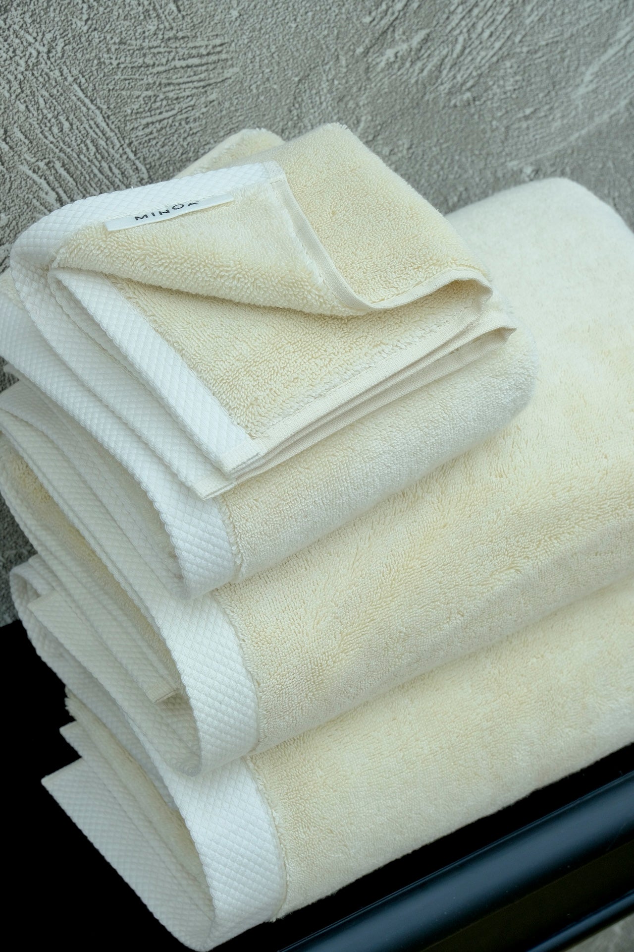 Monte Rosa organic bath towel in Raw Elegance color from Minoa USA Canada, a sustainable luxury bath towel woven from soft Aegean cotton