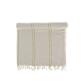 Beige towel with yellow stripes and fringes on a white background