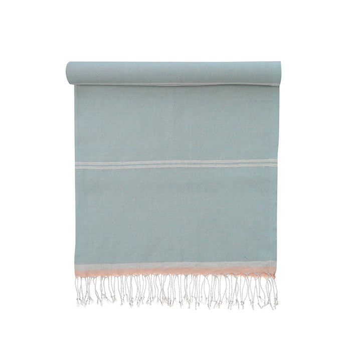 Light blue towel with white stripes and fringes on a white background