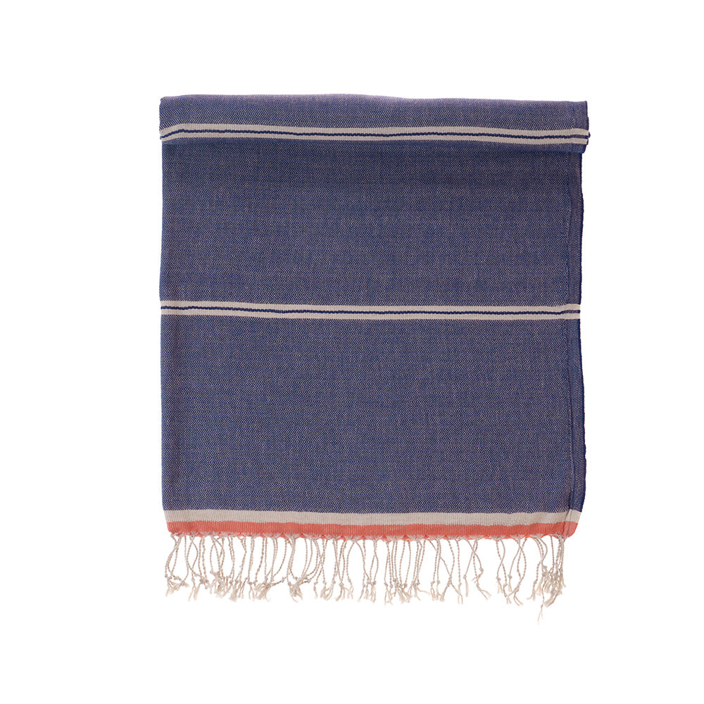Blue towel with white and red stripes on a white background