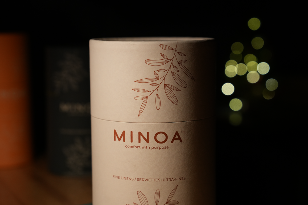 White packaging luxury case containing Plush Lite 500-gram Aegean Cotton guest bath and hand towel set pack of two by Minoa USA Canada, highlighting premium quality and soft texture of organic bath towels