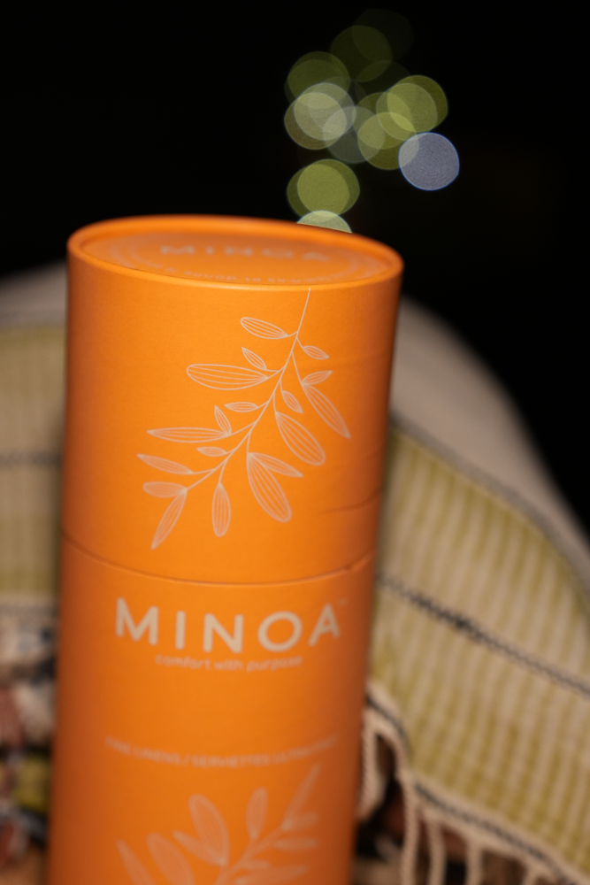 Luxury orange package of Palawan 220-gram organic linen Turkish bath towel, highlighting soft texture, premium quality, and sustainable luxury