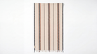 A rectangular woven towel with vertical stripes in beige, brown, and dark gray, finished with fringe along the bottom edge, shown against a plain white background.