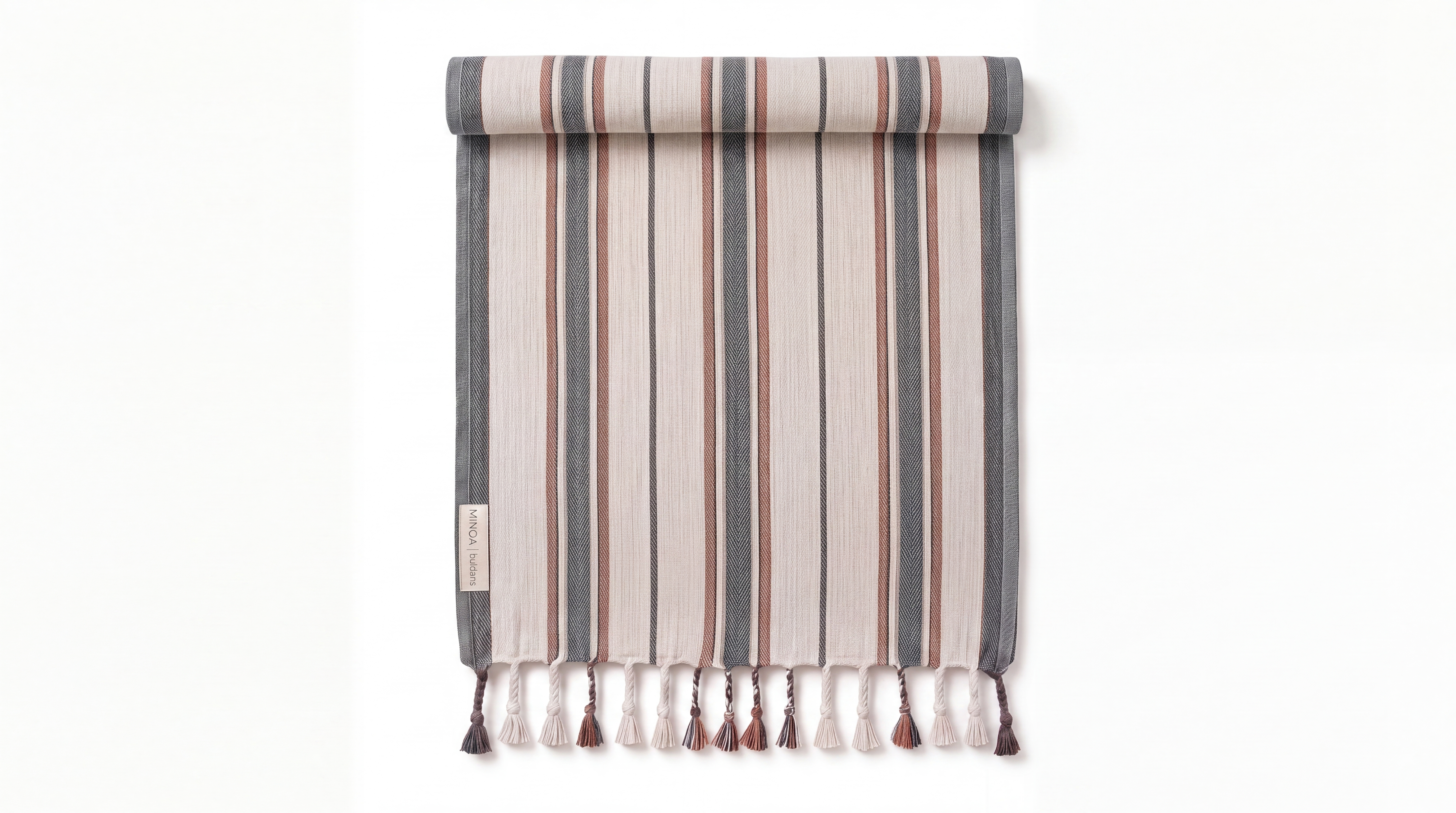 A striped towel hanging flat against a white background, featuring vertical bands in beige, gray, and muted red-brown, with tassels along the bottom edge.