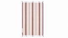 A rectangular woven towel with vertical stripes in cream, dusty rose, and dark burgundy, finished with white fringe tassels on the top and bottom edges.
