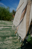 Sustainable Elba Turkish Towel under the sunshine showcasing the light and eco-friendly feel of organic bath towels
