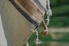 Close-up shot of organic baby blue and orange Elba Turkish towel crafted with sustainable materials
