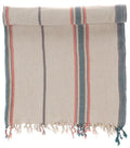 Striped towel with fringes on a white background