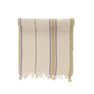 Beige, lime & blue, towel with colorful stripes and fringes on a white background