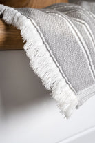 A close up shot of Silver Symphony Elis Organic Aegean Cotton Kitchen Towel crafted with natural, eco-friendly material