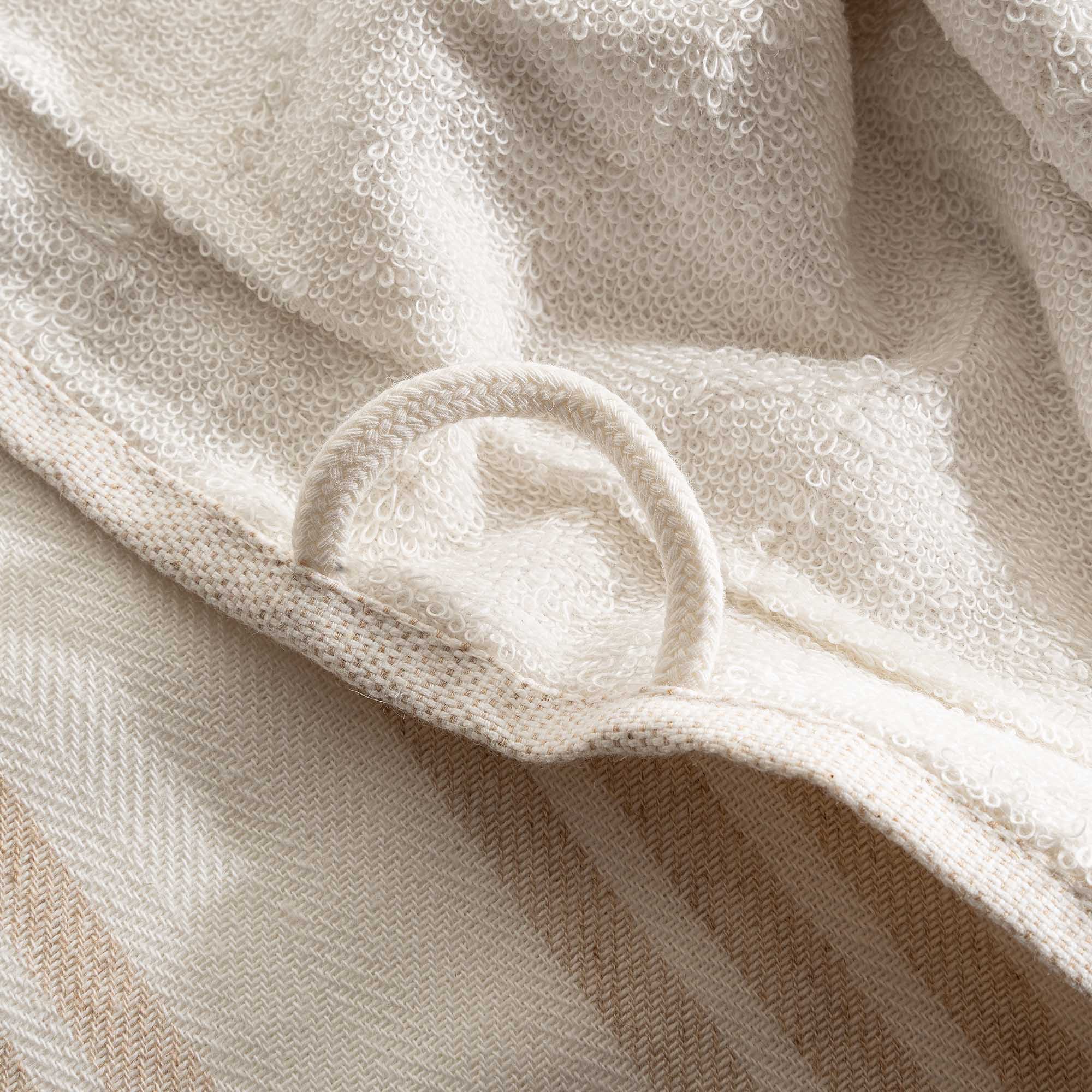A close up shot of Minoa's Erva Organic Aegean Cotton Bath Set, three pieces