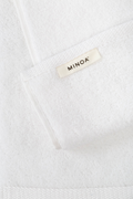 Close-up of Moonlight Pearl Plush Lite Aegean Cotton towel by Minoa USA Canada, highlighting soft, plush texture and luxurious feel of premium organic bath towels
