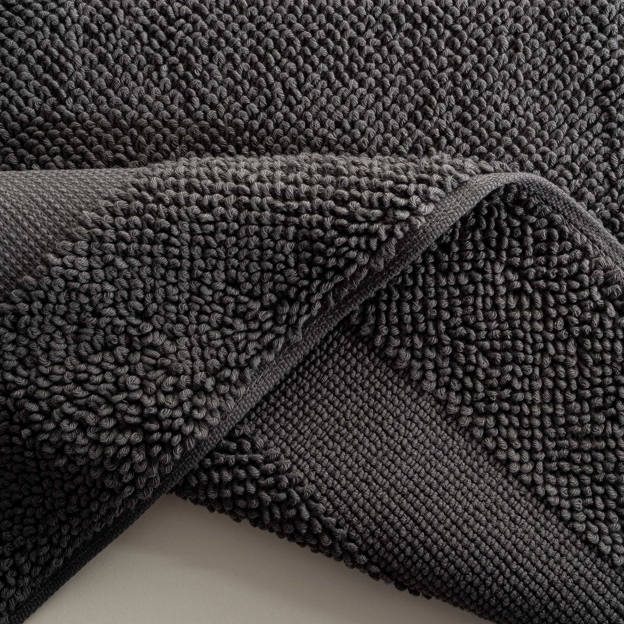 Close-up of the Kaia Aegean Cotton Bath Mat in Charcoal Charm, showcasing its rich colour, plush texture, and refined craftsmanship