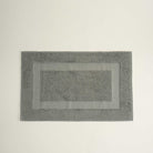 Kaia Aegean Cotton Bath Mat in Meadow Sage, displayed on its own, showing its soft texture, earthy tone, and refined quality
