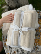 Two Raw Elegance Monte Rosa 820-gram organic Aegean cotton luxury bath towel sets, showcasing plush texture, luxurious feel, and eco-friendly design