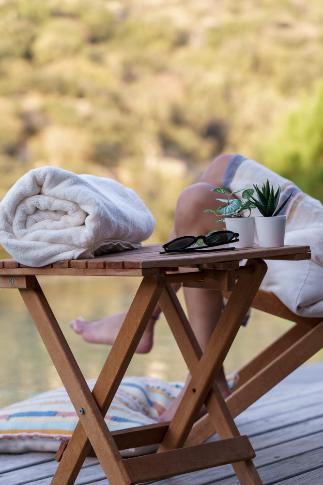 Plush Lite 500-gram Aegean Cotton large bath towel pack of four in Moonlight Pearl by Minoa USA Canada, rolled up to showcase luxurious softness, elegant color, and premium organic bath towels quality