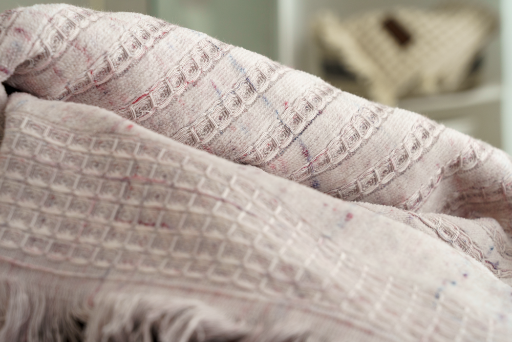 Close-up of Maia Pink Powder organic bath towels set, including bath, hand, and washcloth, showcasing luxurious texture and premium organic cotton quality